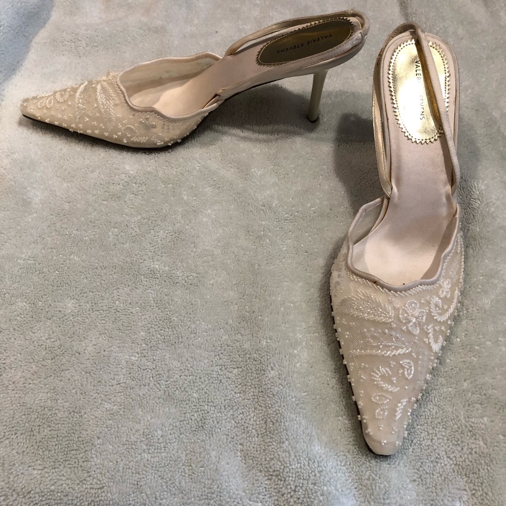 Never worn beige pearl encrusted. Heels